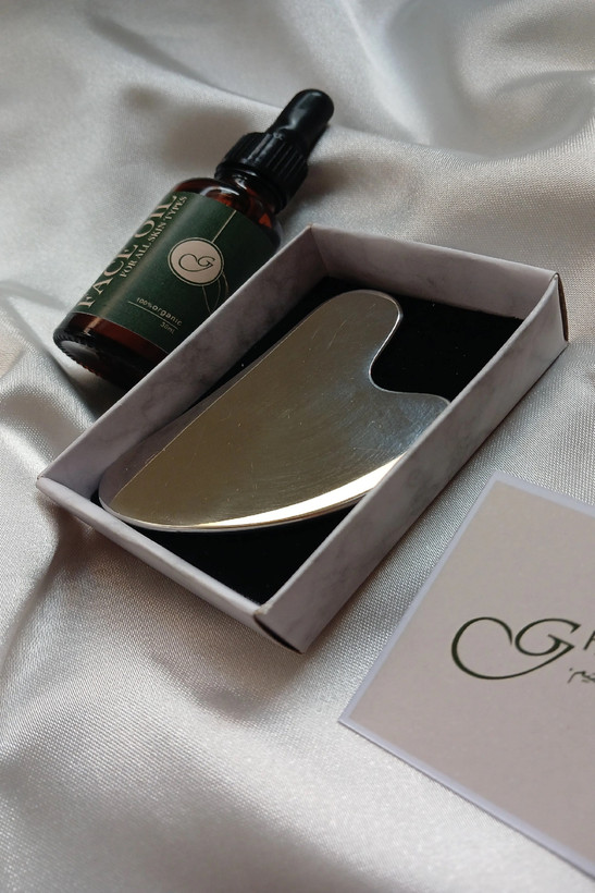 گواشا استیل + روغن ماساژ صورت +هدیه