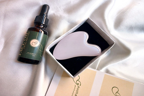 سنگ گواشا رز کوارتز + روغن ماساژ صورت+هدیه