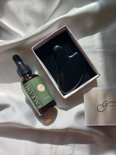 سنگ اونیکس مشکی +روغن مخصوص ماساژ صورت +هدیه